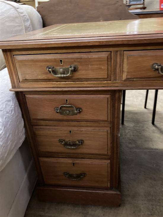 A late Victorian walnut pedestal desk, width 122cm depth 68cm height 76cm